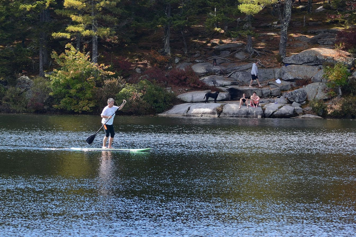 People of all ages having fun at our swimming hole.