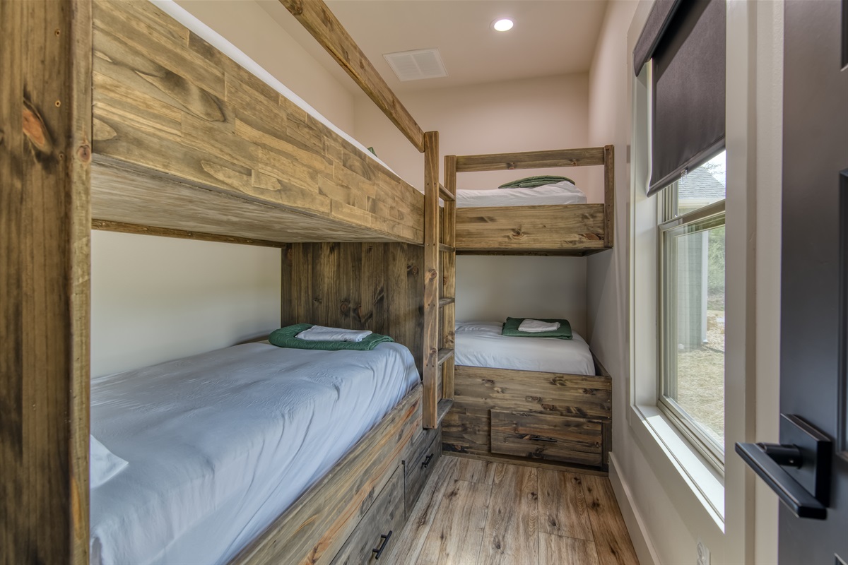 Bunk room sleeps 4 with minimal storage space