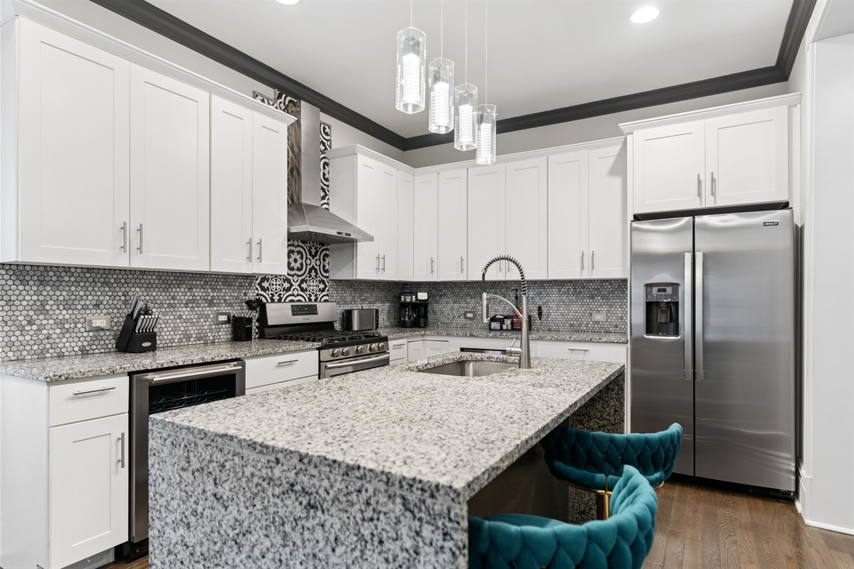 The heart of the home, fully equipped for everything from morning coffee to group dinners.