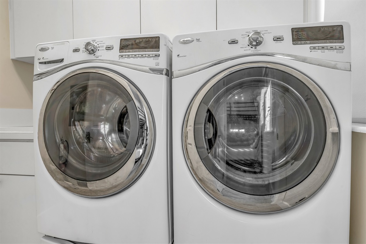 A large washer and dryer for your use.