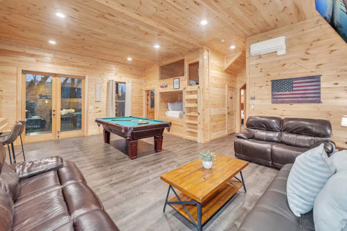 Lower Level Entertainment Room that opens to a balcony