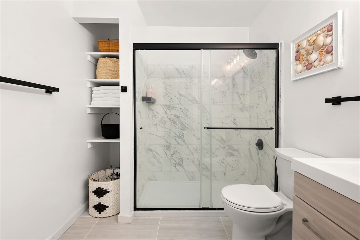 Updated modern bathroom with walk in shower