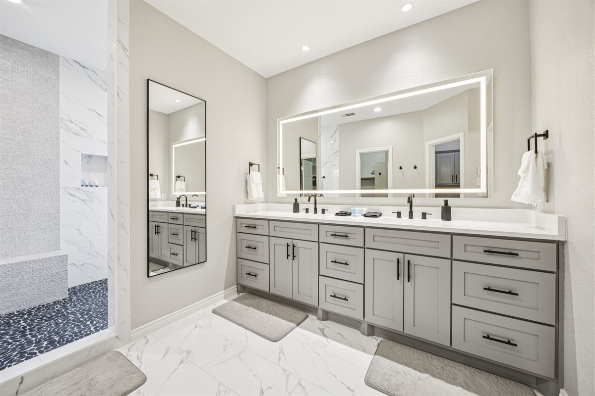 Dual vanities make morning and evening routines a breeze.