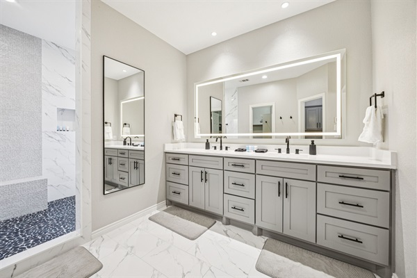Dual vanities make morning and evening routines a breeze.