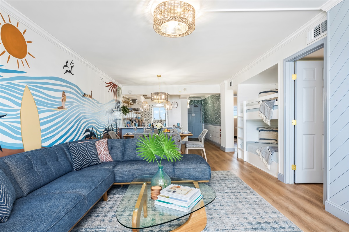 Spacious living room with modern coastal style.