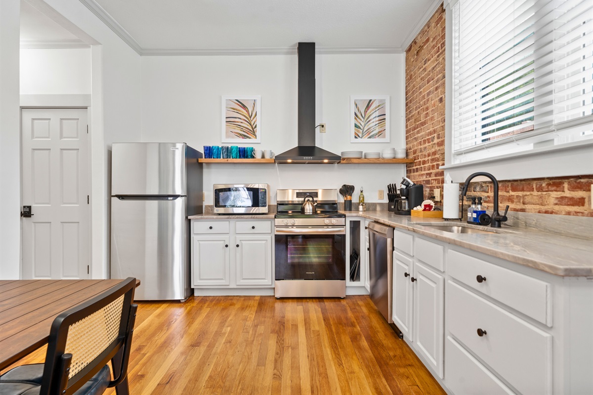 The kitchen is designed with functionality and style in mind, offering everything you need for meal prep.