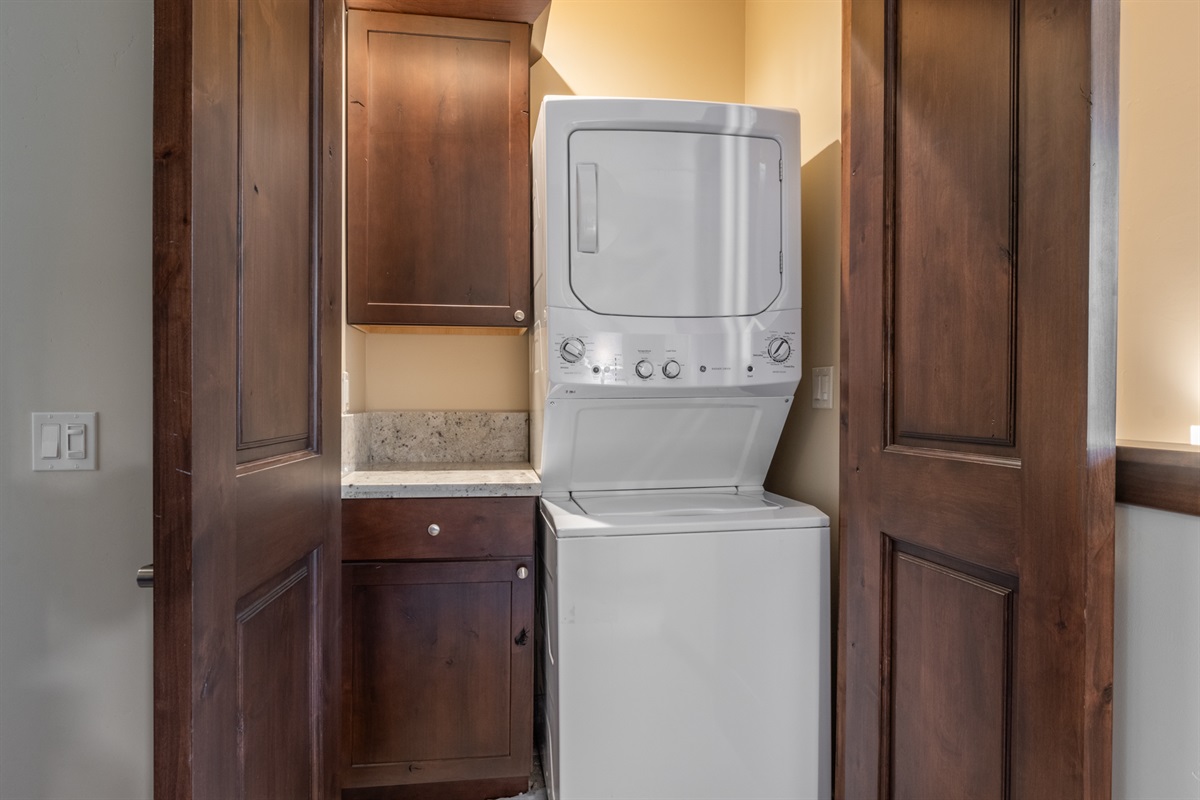 Laundry’s a breeze with the washer and dryer tucked into the stylish third-floor foyer—because even washing up shouldn’t sacrifice great design.