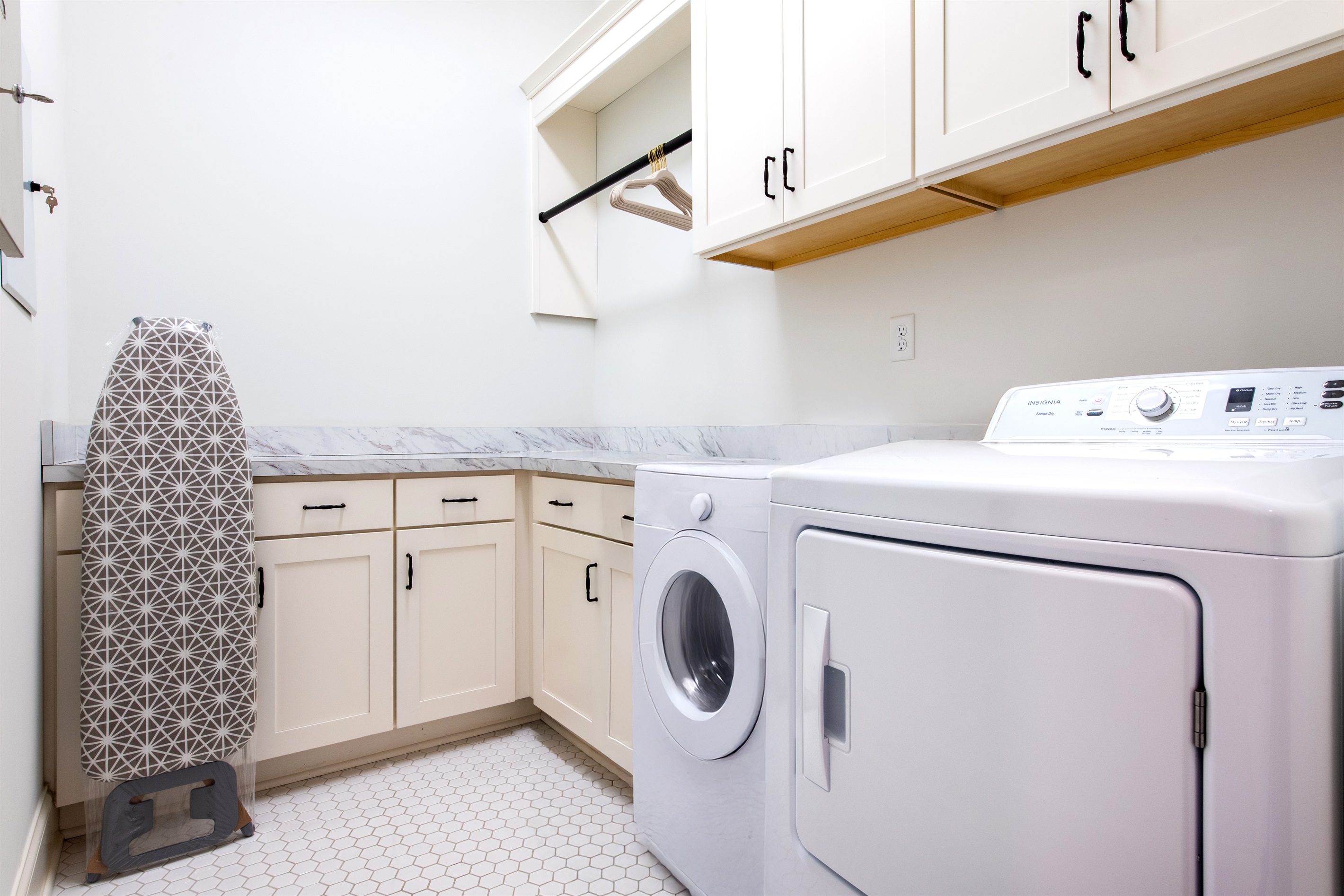 Convenient washer, dryer, and ironing board for a hassle-free stay.