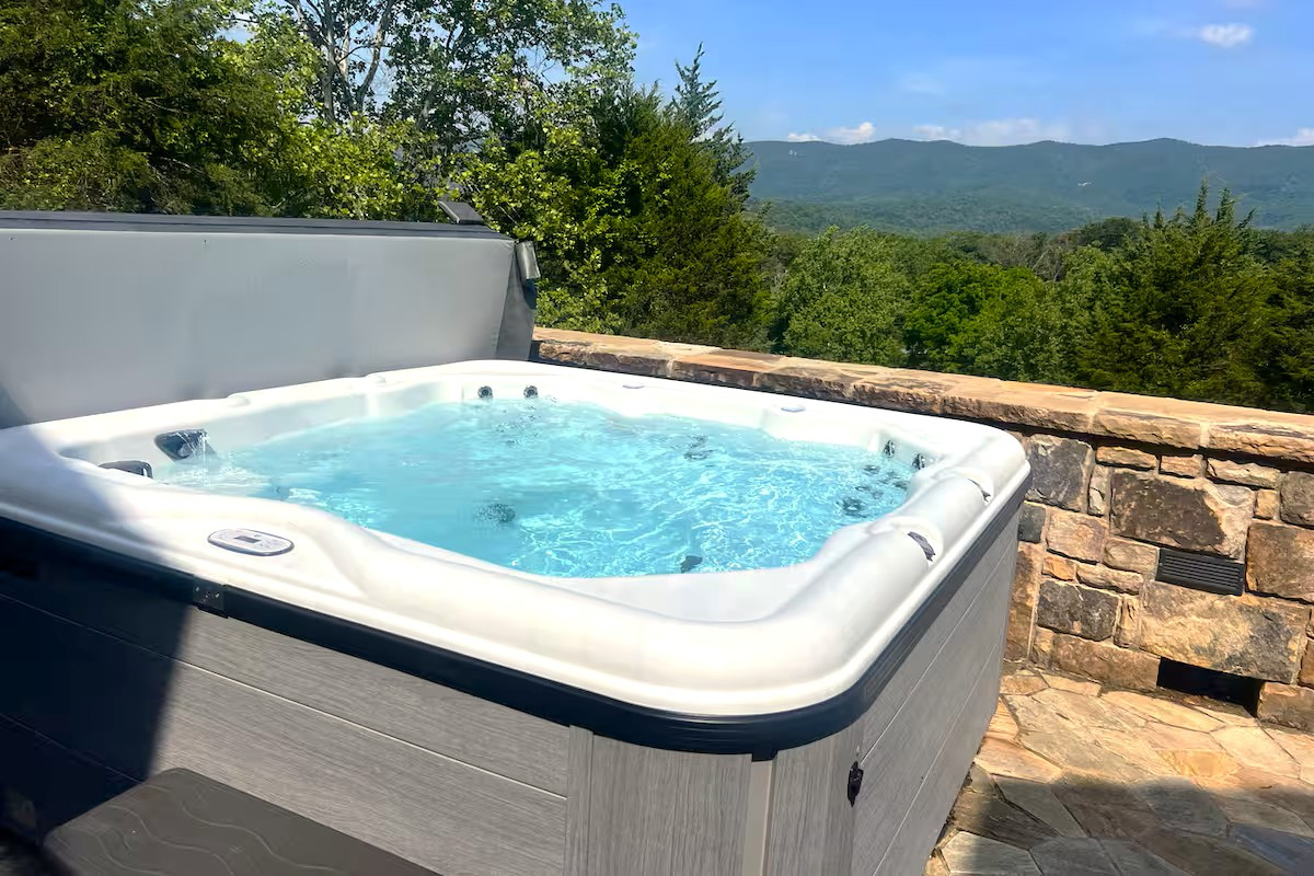 Relax, soak, and take in panoramic mountain views from the hot tub