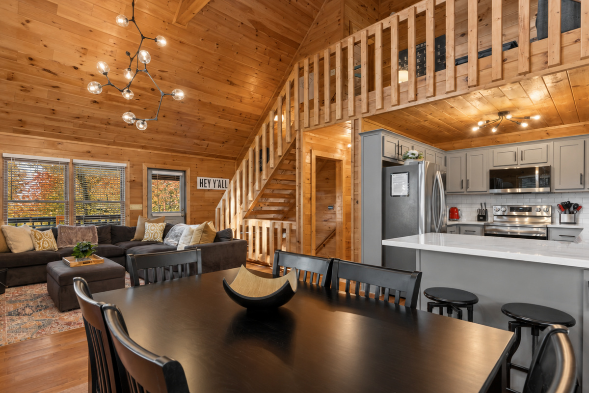 The heart of the home, where meals and moments are shared beneath vaulted wooden ceilings.