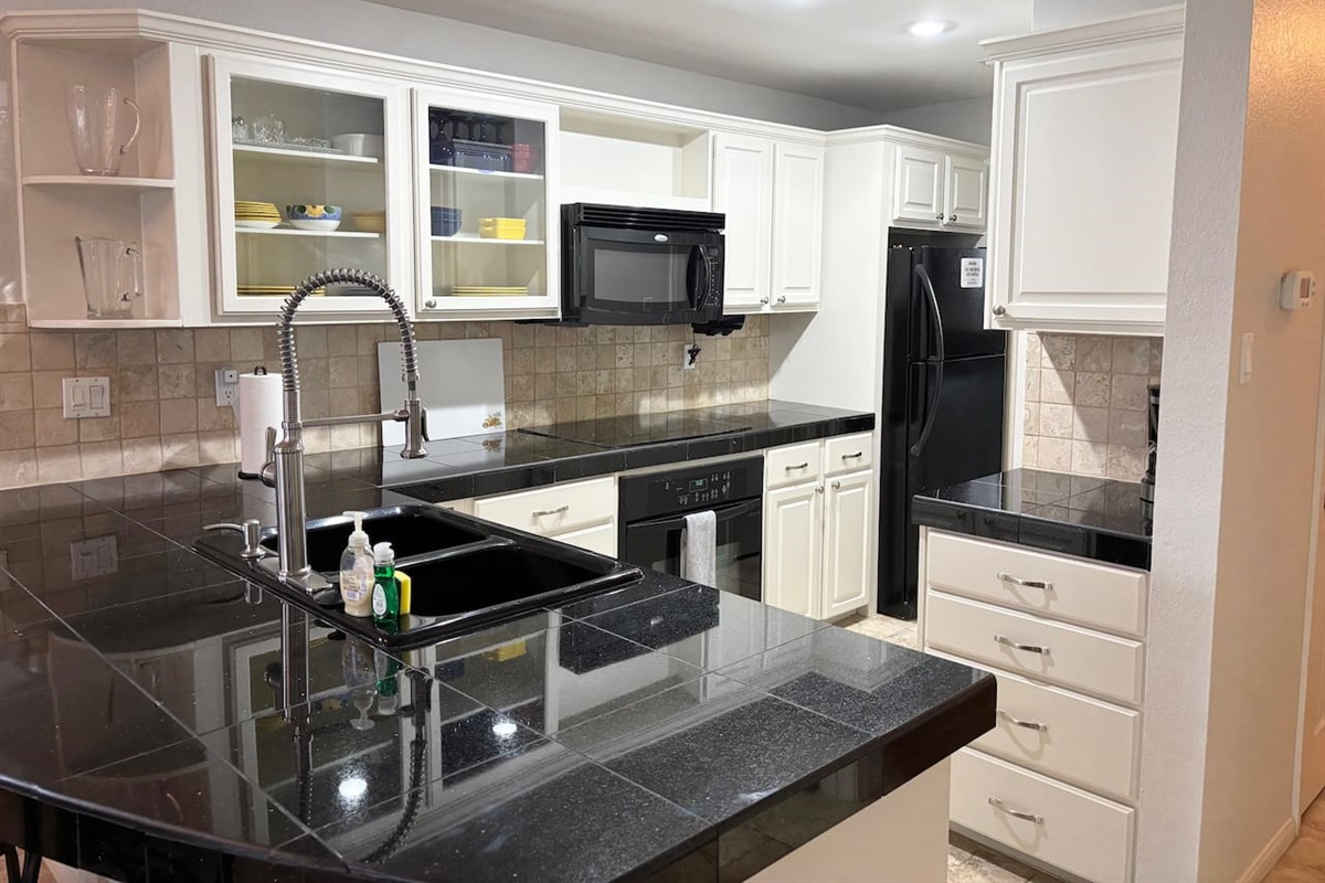 Full Size Washer/Dryer off Kitchen Area