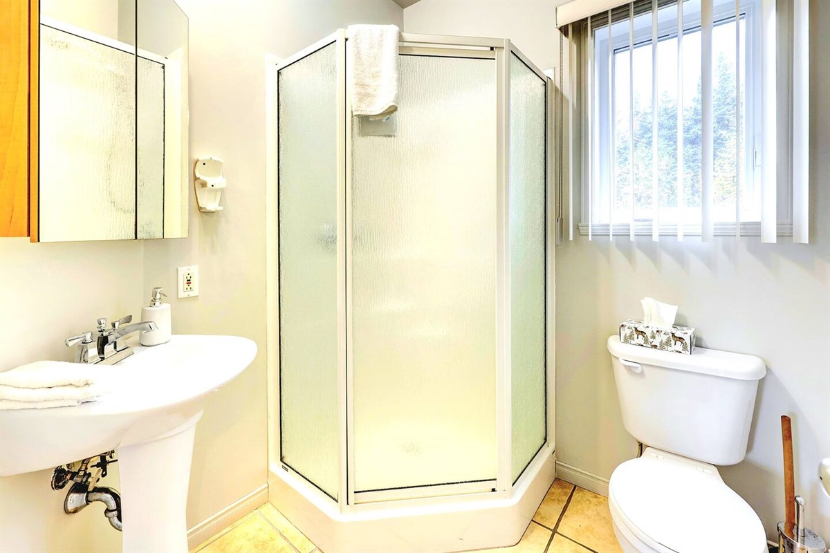 Enjoy a relaxing bath in this spacious bathroom.