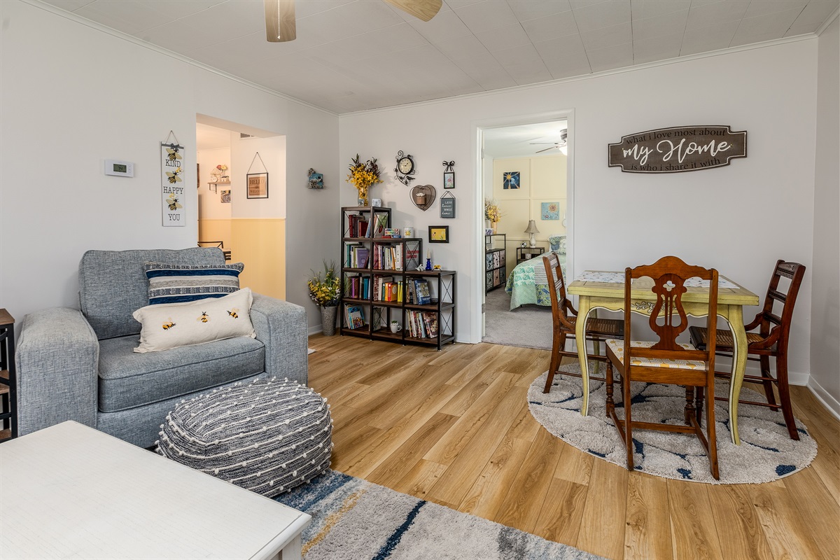 Kick back & unwind at the Cozy Bee Hive! From the soft seating and charming bee accents to the stocked bookshelf and smart TV, this space was made for movie nights, morning coffee, and everything in between.