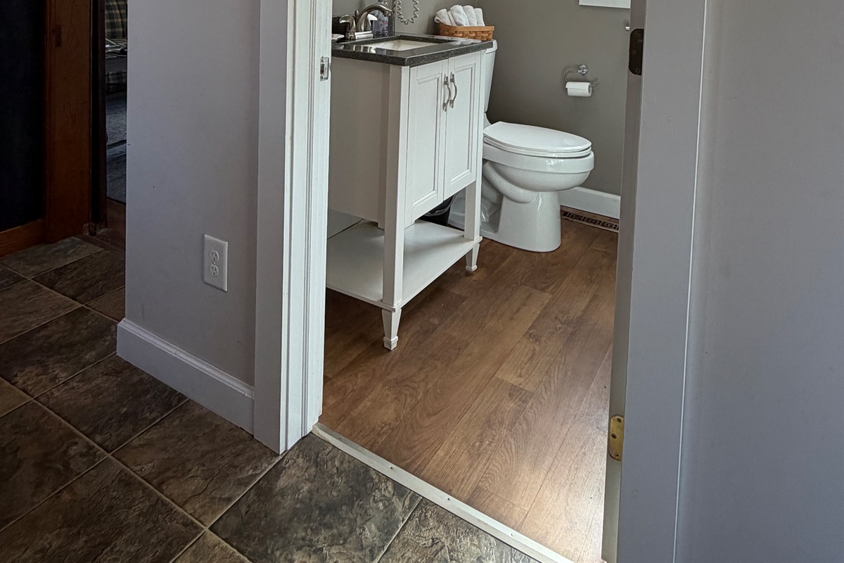1st floor full bathroom w/ shower, note the built in hair dryers in all bathrooms.