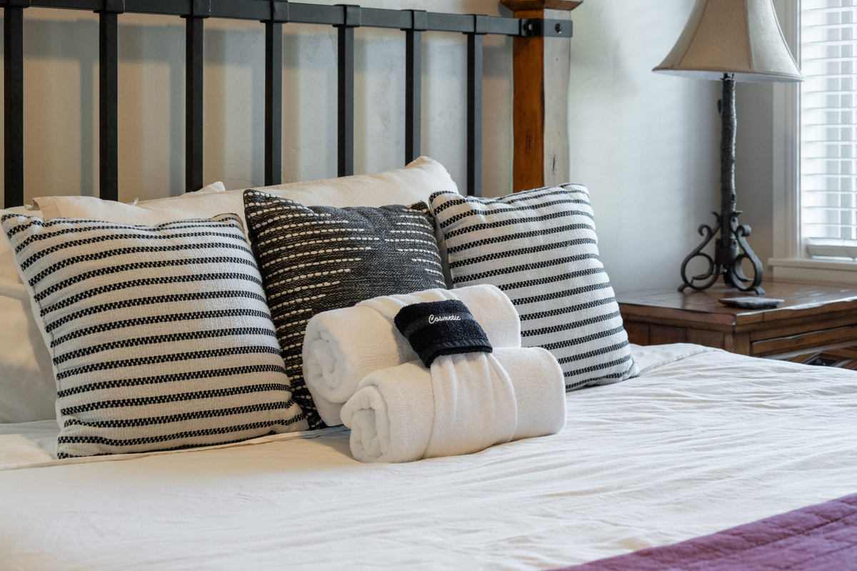Premium bedding and soft linens ensure a relaxing night's sleep.
