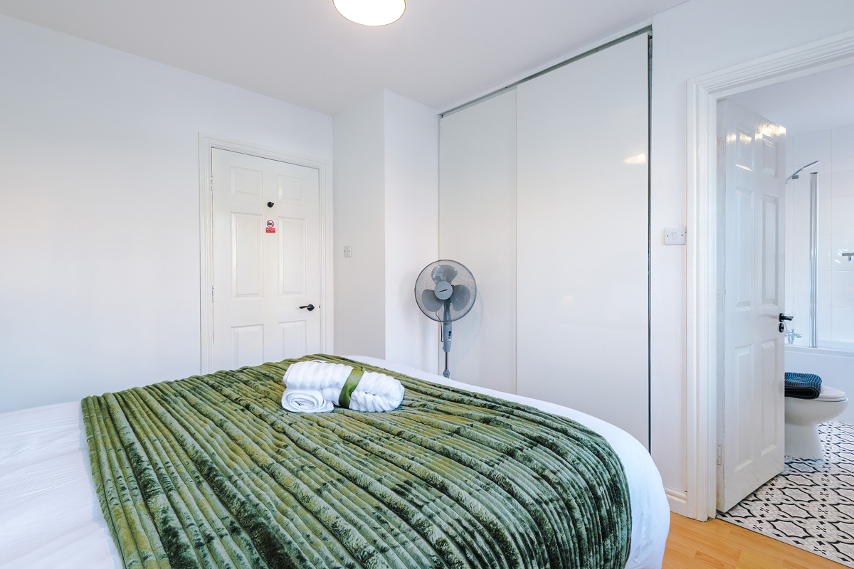 Hotel comfort King bed with ensuite, built-in wardrobes with hangers & blackout curtains