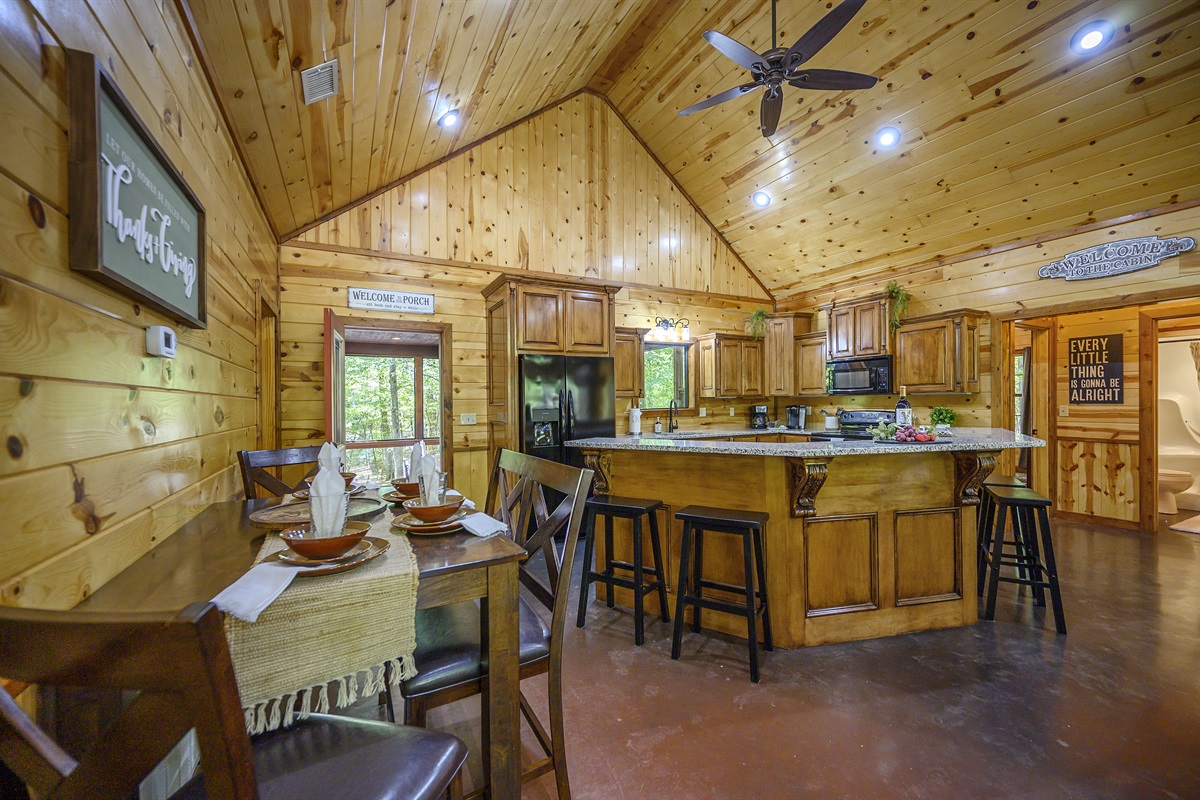 The kitchen table seats 5 and there is a second dining table in the sunroom.