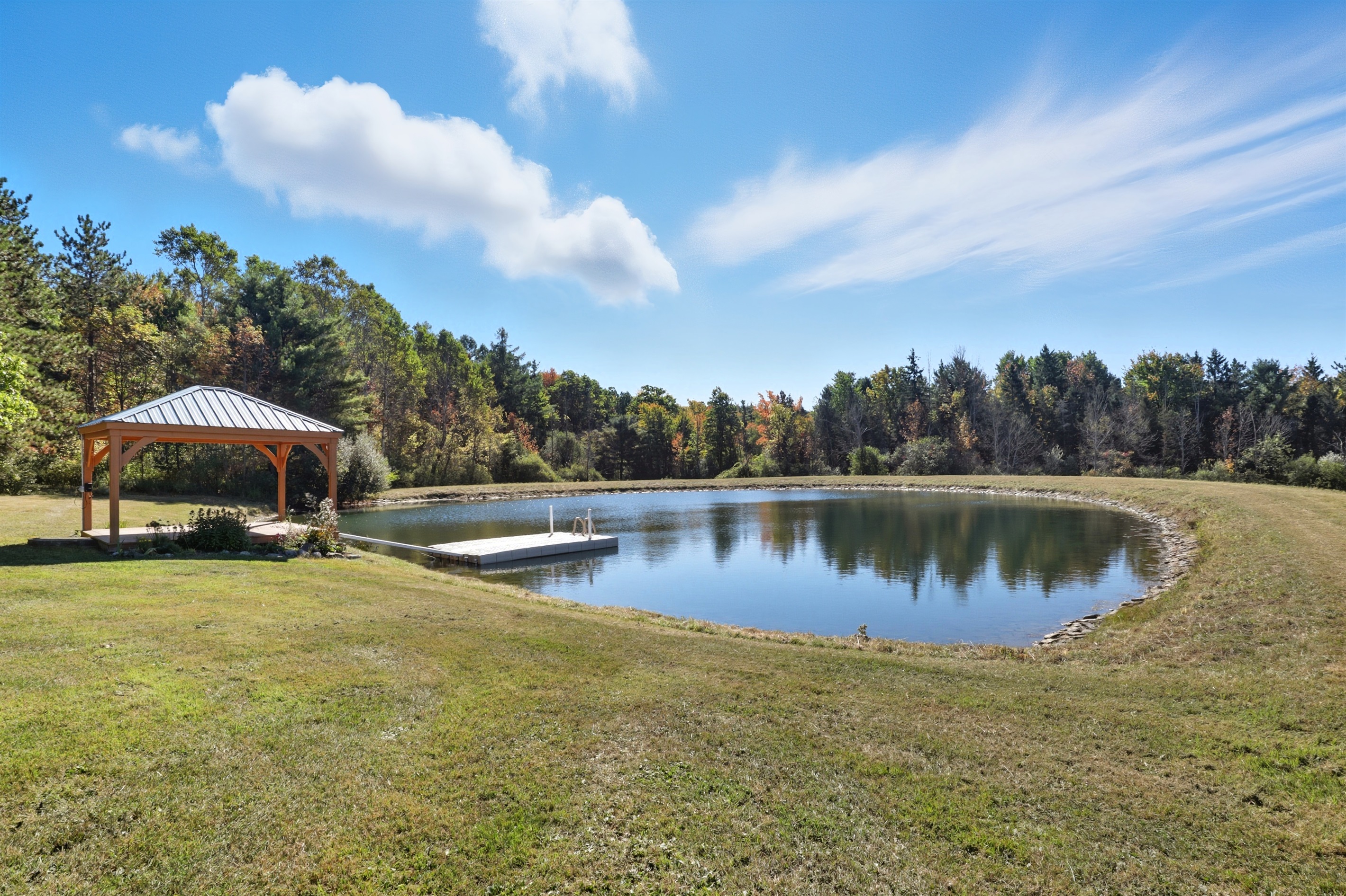 Pondside gazebo perfect for picnics or gatherings.