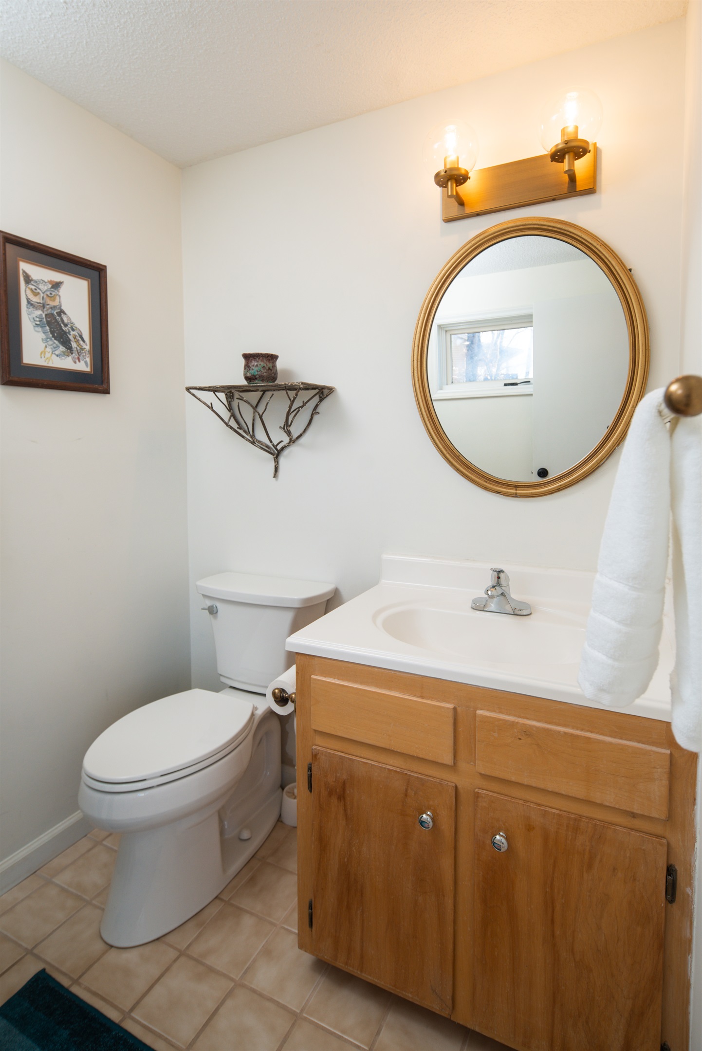 The half bath is located on the same level as you enter the home.