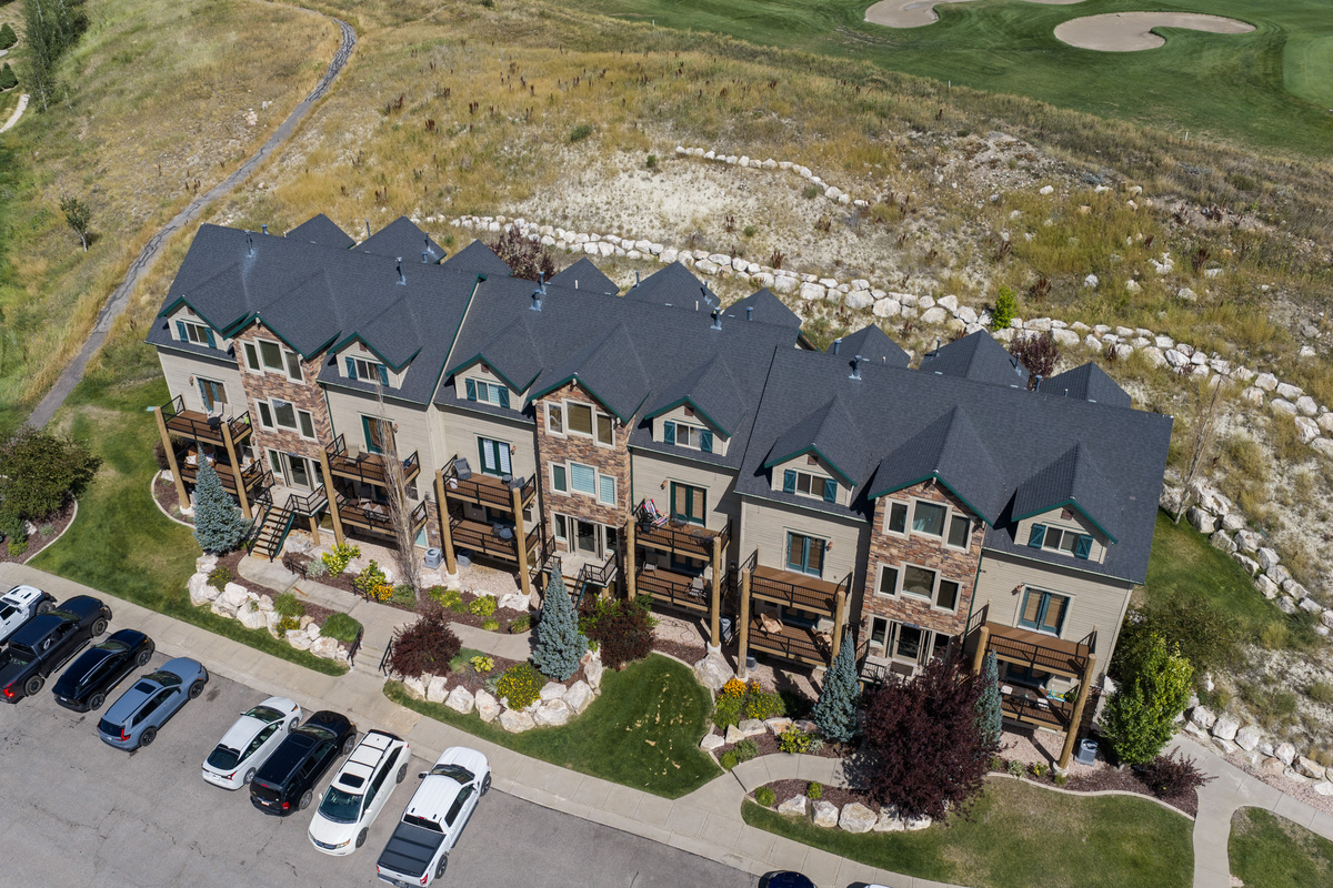 The townhome-style setting offers a comfortable balance of privacy and convenient community access.