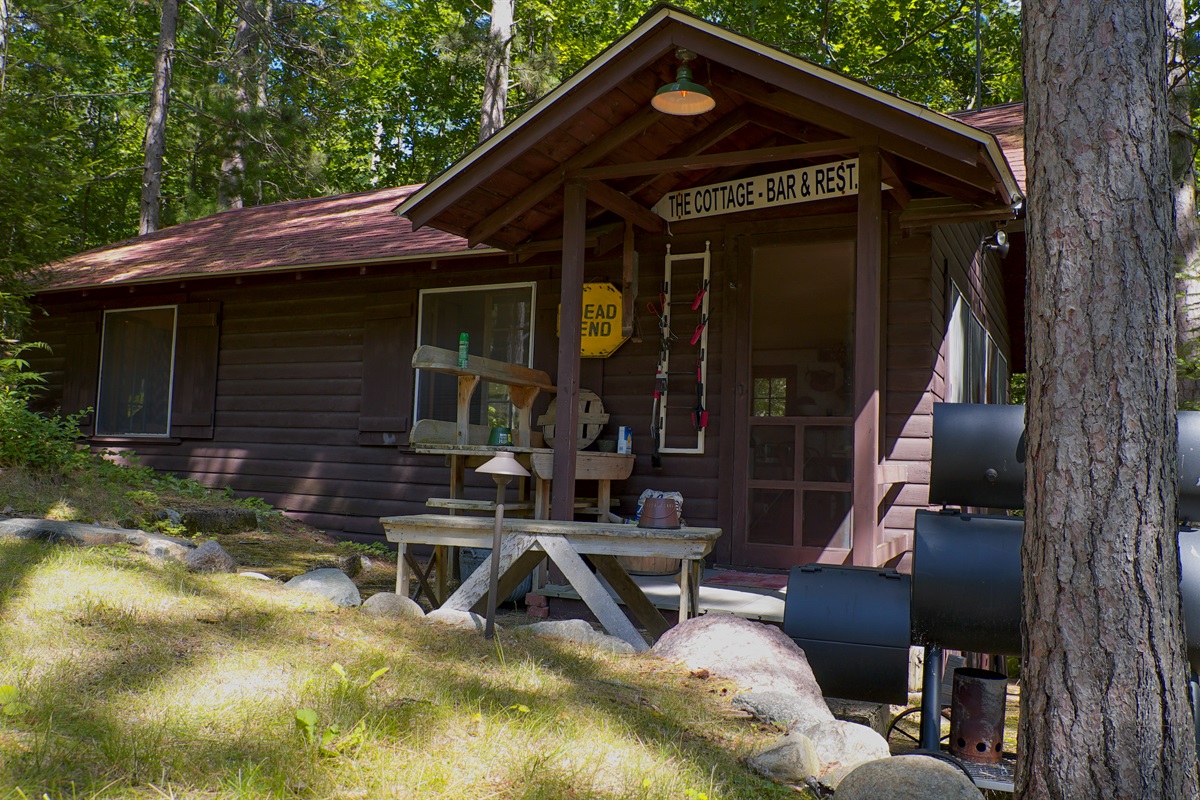 The cottage sleeps 4 with two bedrooms, full bathroom, and kitchenette.