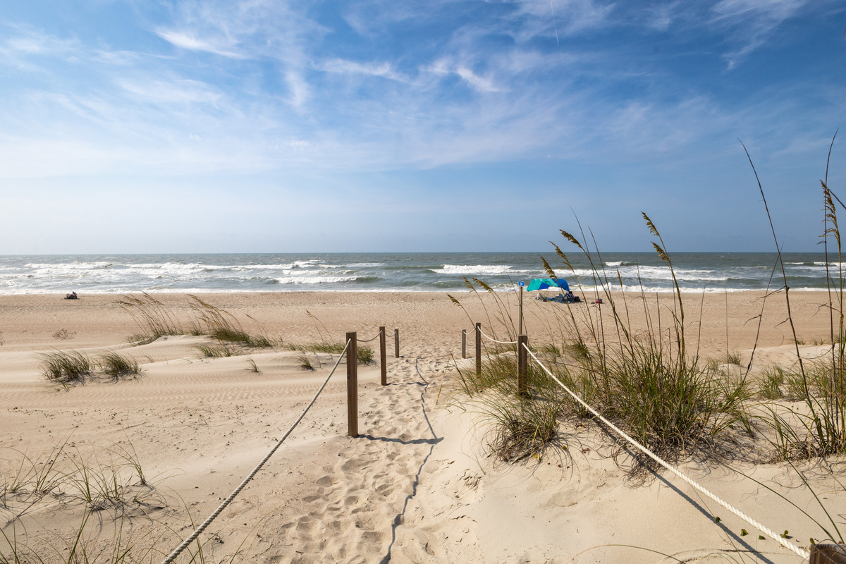 Step onto the beach and enjoy beautiful ocean views just beyond the dunes