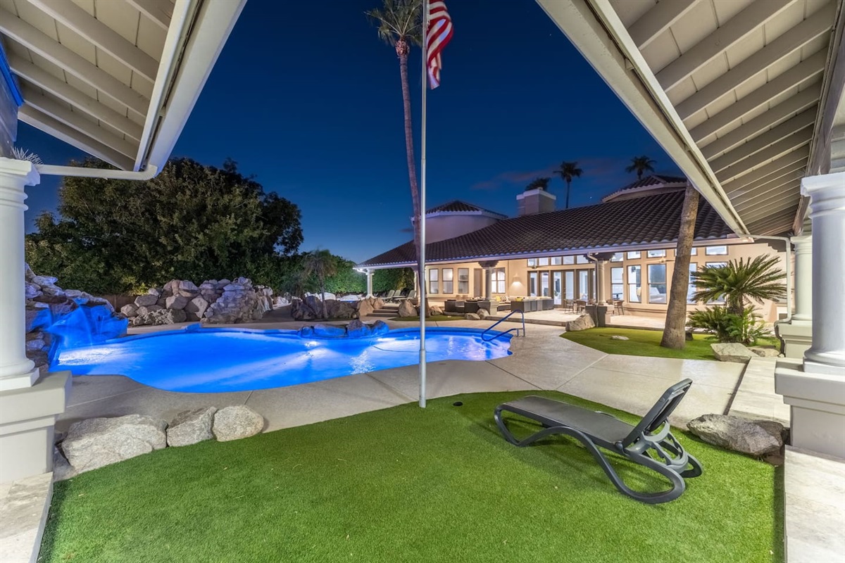 Take in glowing pool views and the elegant patio ambiance—your private oasis under the stars.