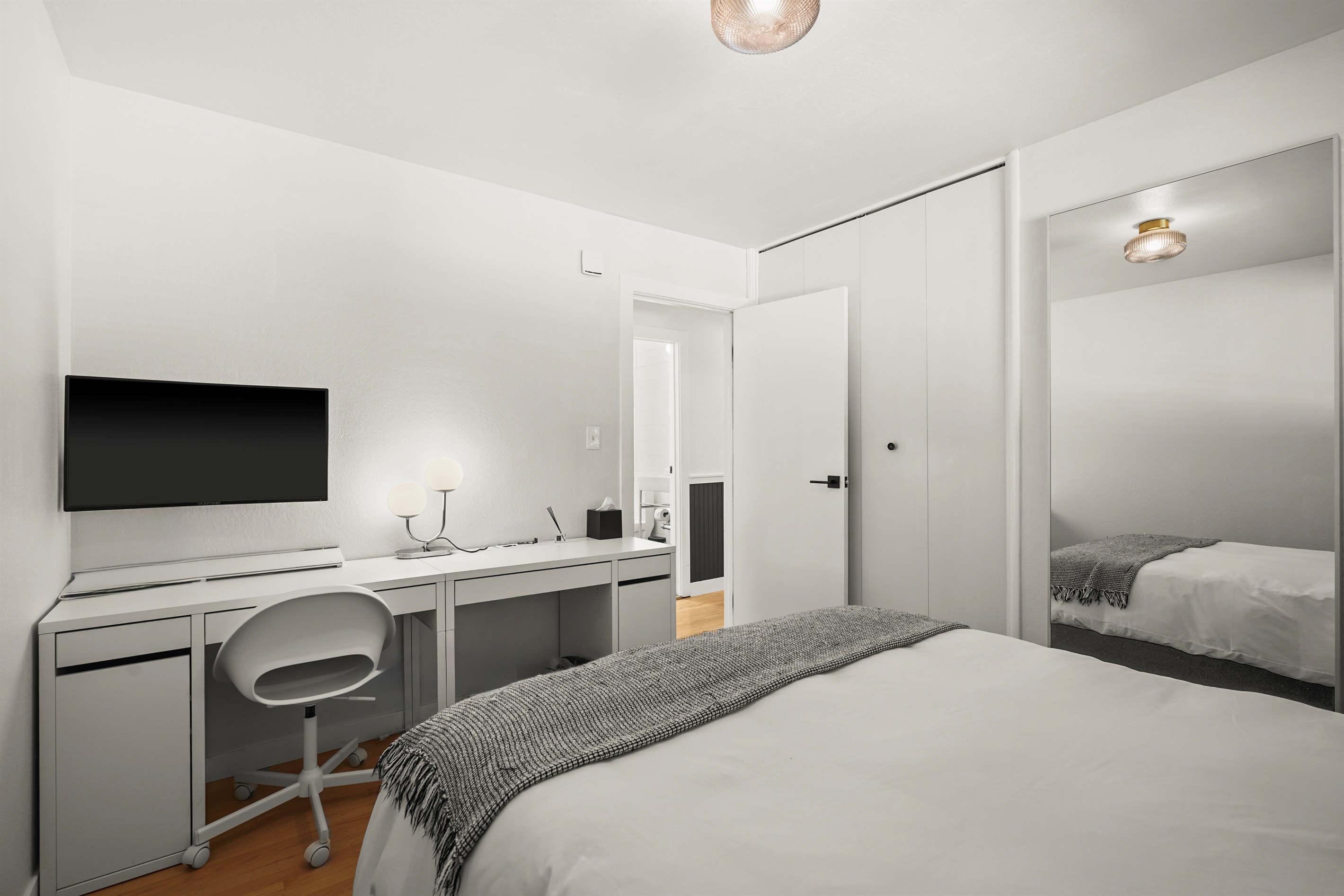 Well-appointed bedroom featuring a queen bed and relaxing ambiance, perfect for couples, friends, or family members.