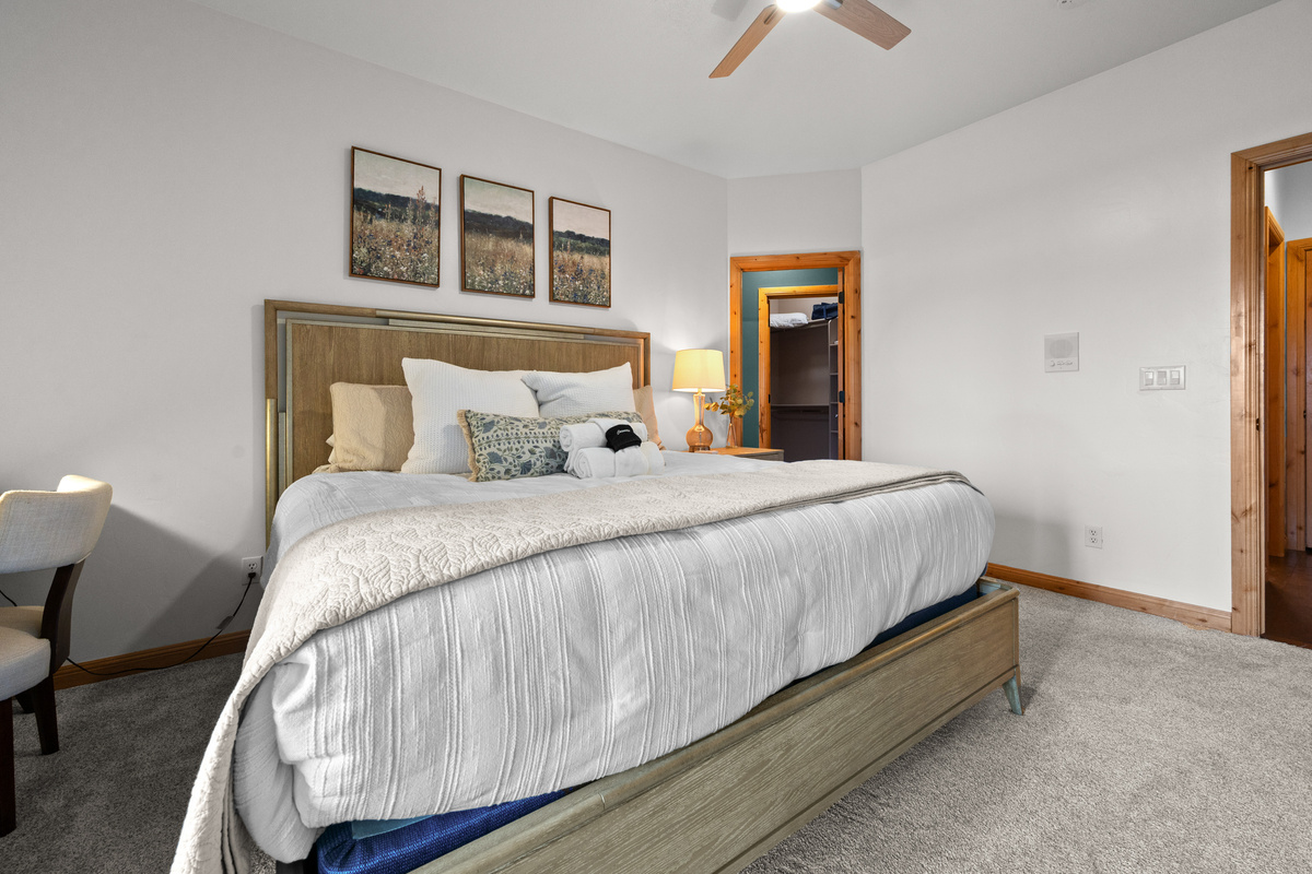 Comfortable primary bedroom provides a peaceful retreat after a full day of Utah adventures.