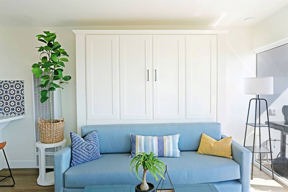 Here is a picture of the Murphy Bed up close in the closed position.  Just remove the sofa back and seat and easily pull (very easy because of air shocks) on the handles and you are ready for bed :)