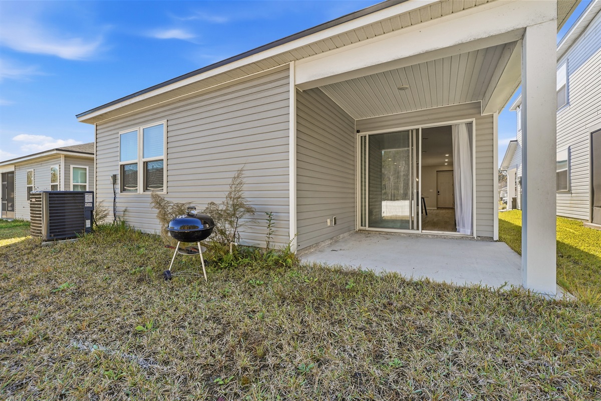 Back yard with grill and patio
