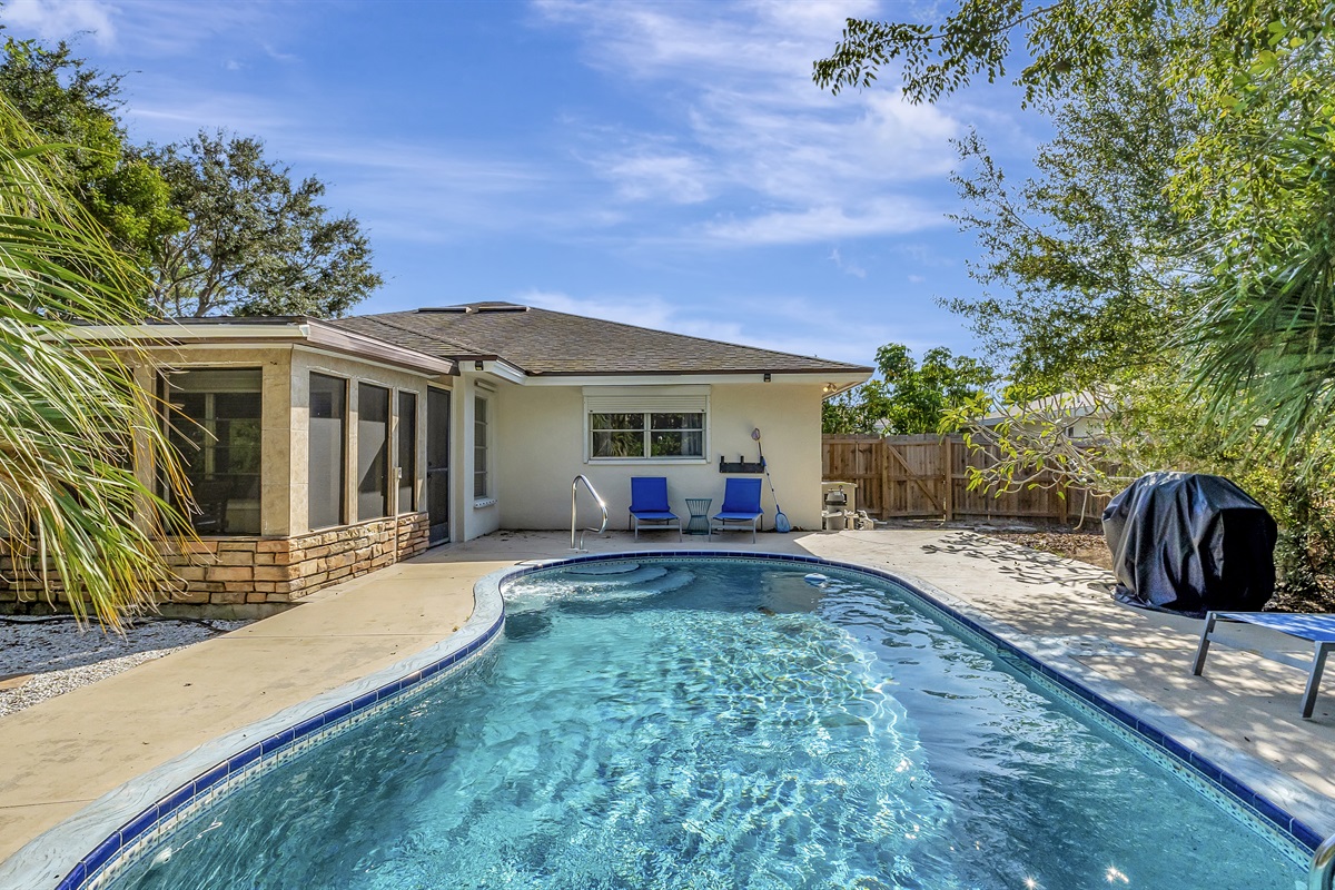 The pool area is just outside the house