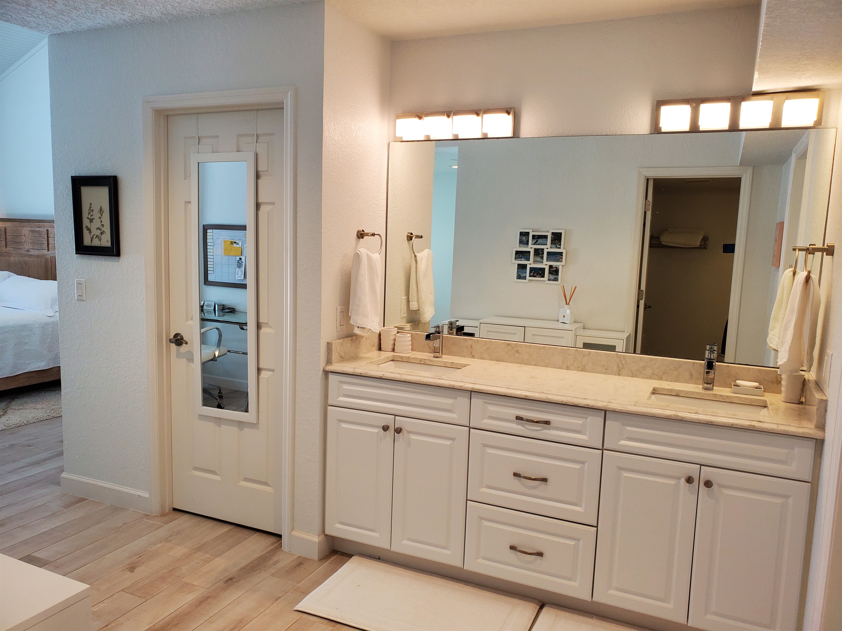Master private bathroom with large closet and double sinks.