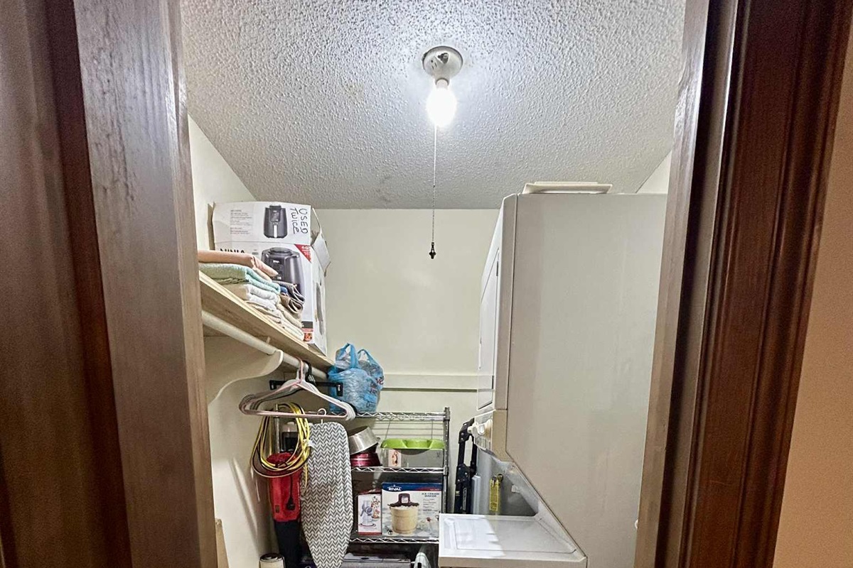Laundry room with extra amenities like crock pot, air fryer, fans and more!