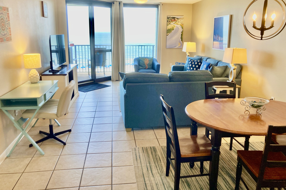 Seating for 4 at the dining table, and a desk for your laptop!