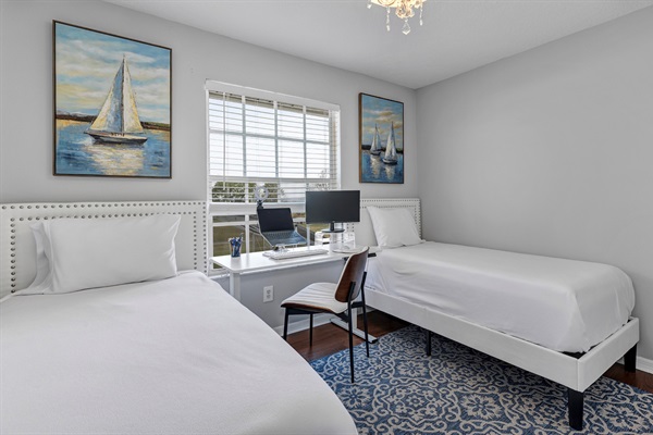 Two twin beds with work station. Office printer also available.