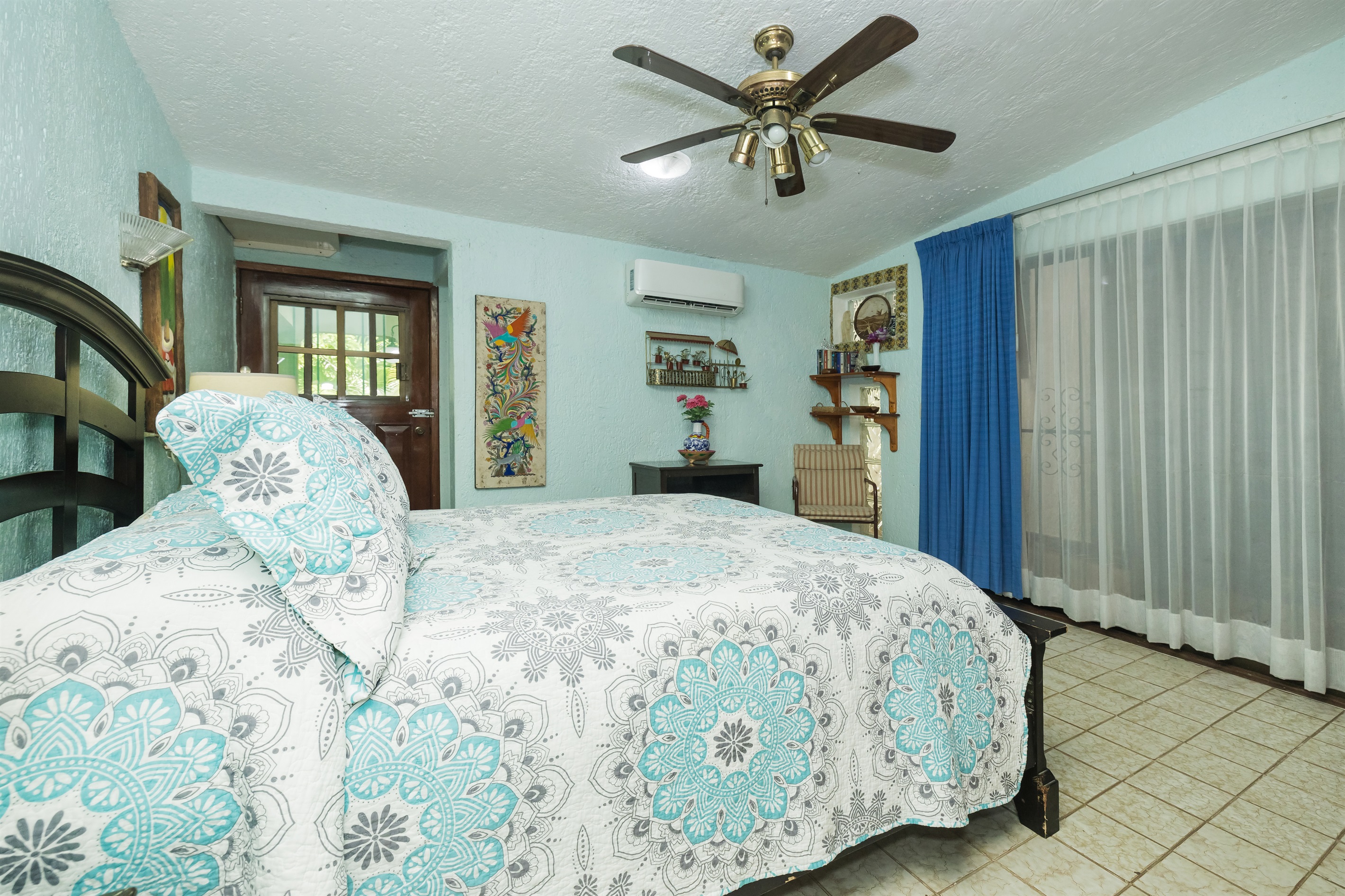 Bedroom 1 with Private Bathroom and Access to Backyard