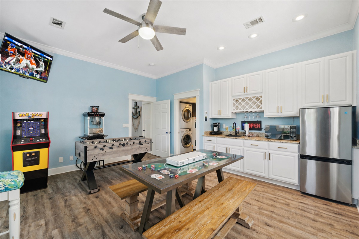 Game room: poker, foosball, arcade, popcorn machine, board games