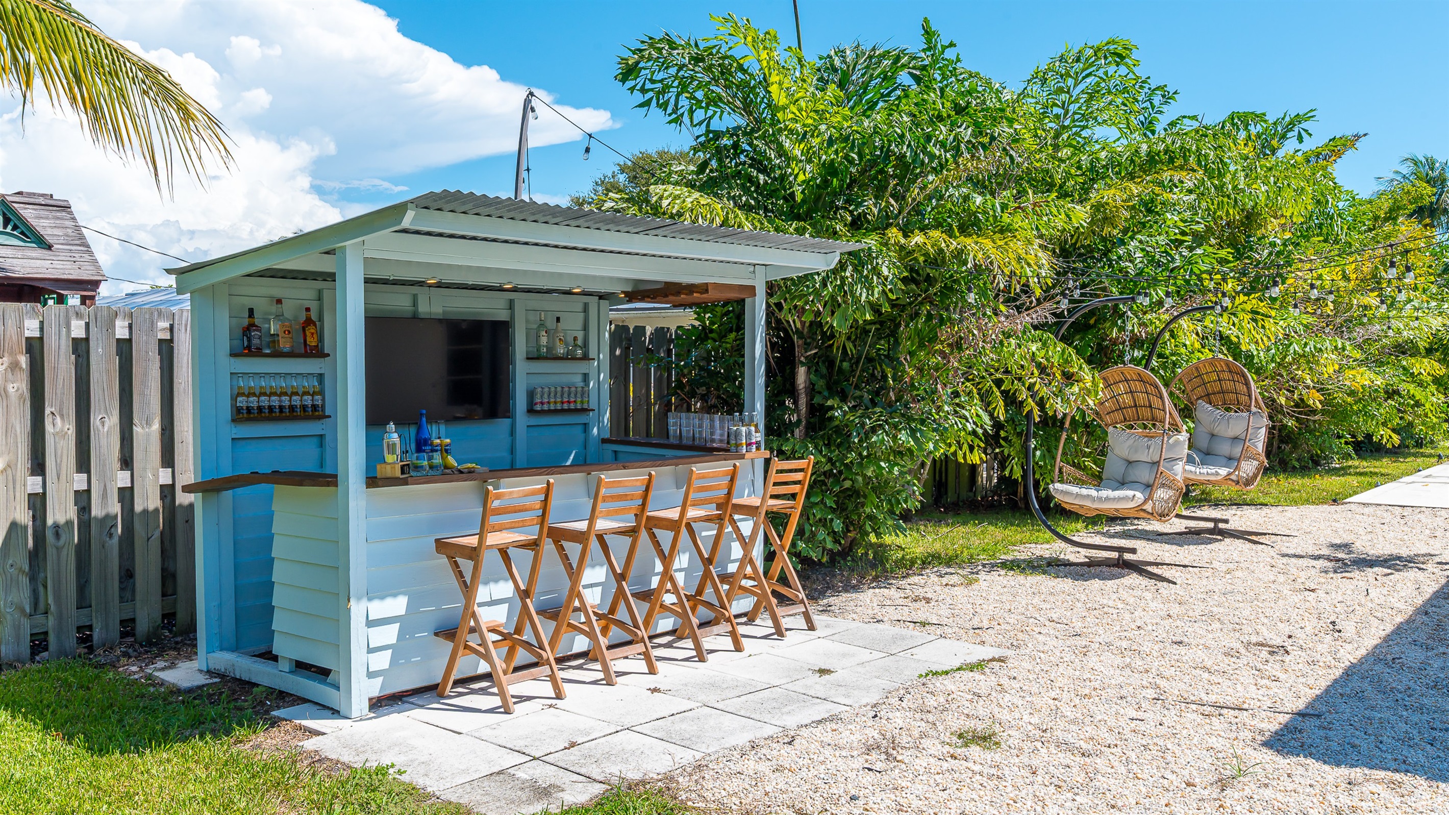 Sip cocktails and enjoy the laid-back vibes at your private outdoor tiki bar, complete with bar seating and a mounted TV. It’s the perfect spot to mix drinks, watch the game, or gather with friends under the Florida sunshine.