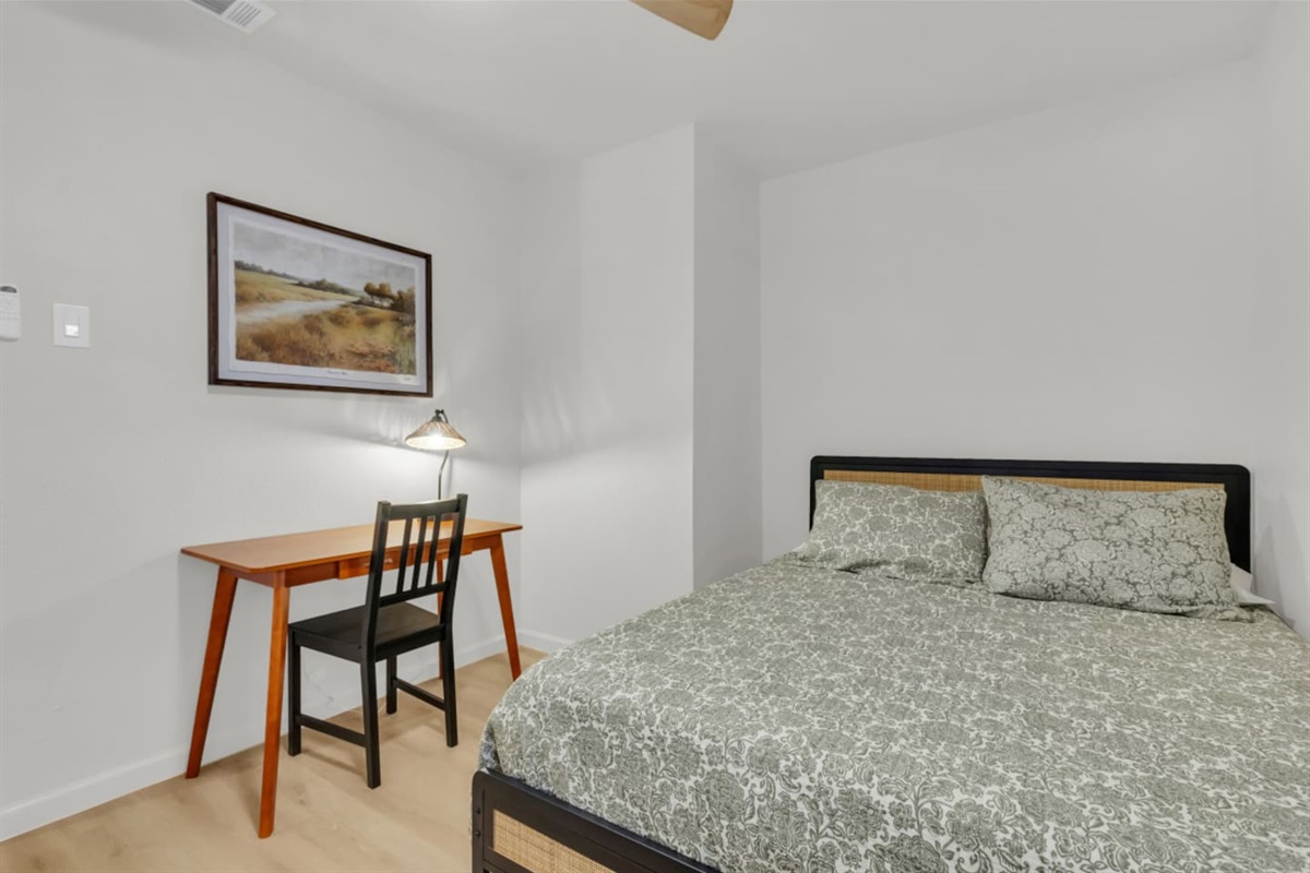 Bright workspace featuring a full dedicated workspace, cozy lighting, and storage nearby. Perfect for business travelers and longer getaways.