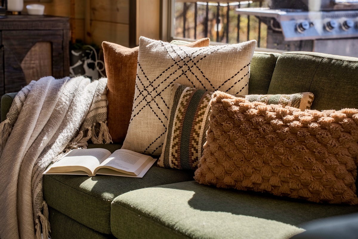 Soft pillows, cozy textures, and cabin comfort. Made for lounging.