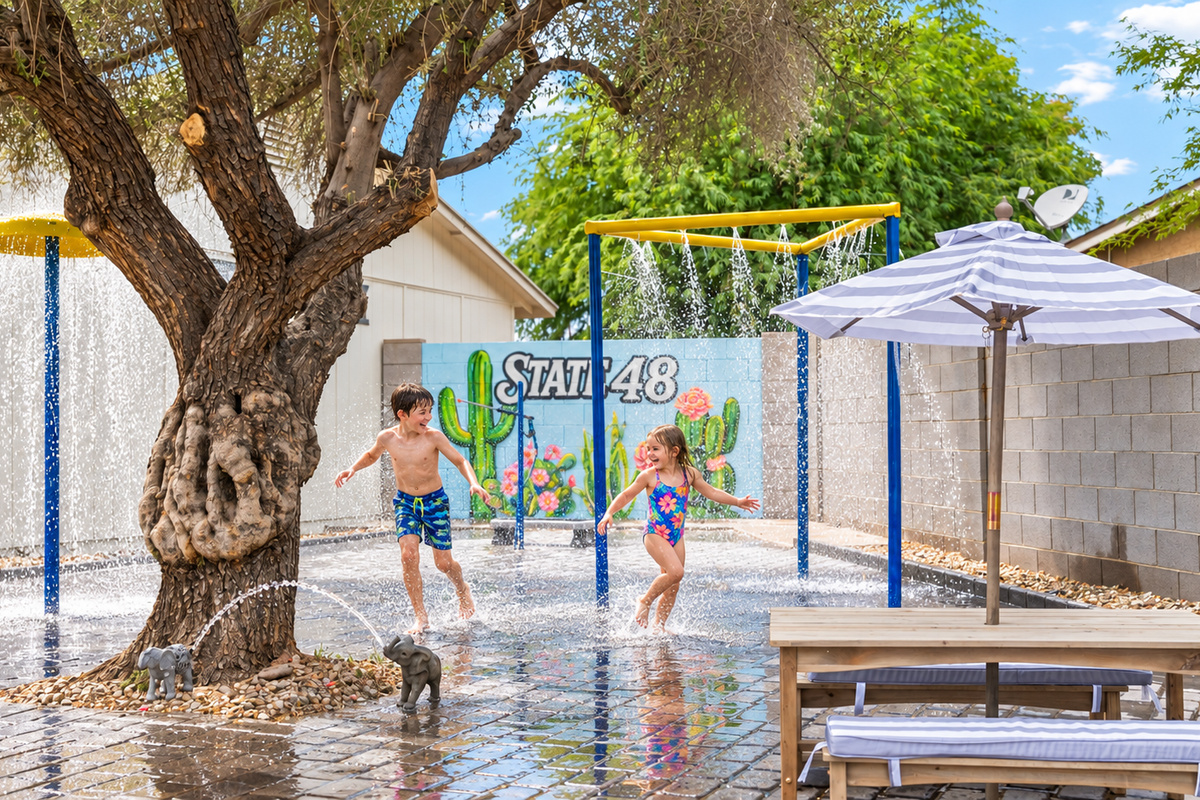 Your kids (young and old) will have HOURS of fun staying cool with the custom-made splash pad patio in the back yard!