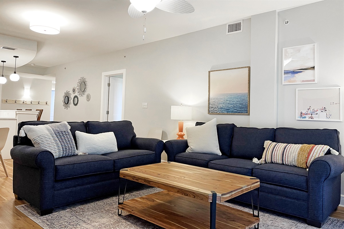 TIDELANDS 2 | Comfy living room with 65" Smart TV. Here's your queen sleeper sofa.