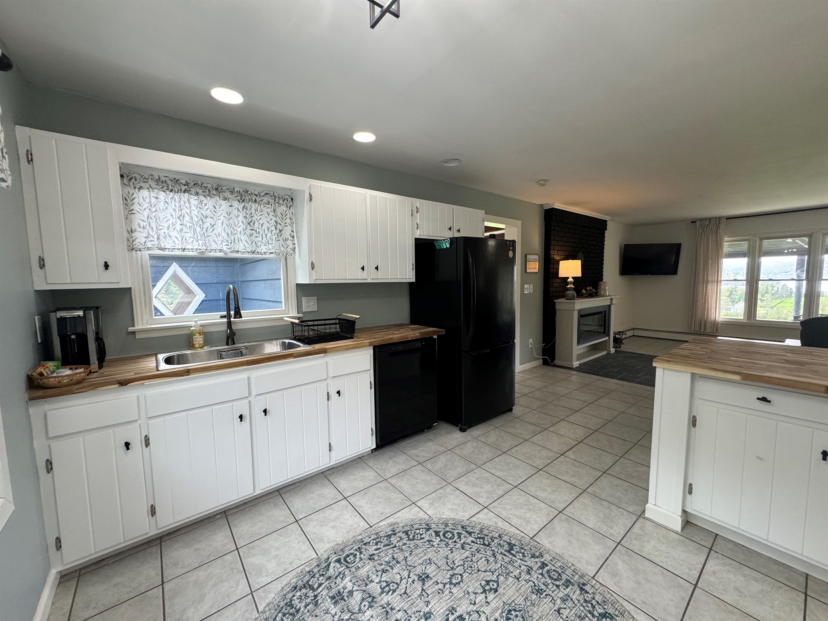 Kitchen with living room beyond