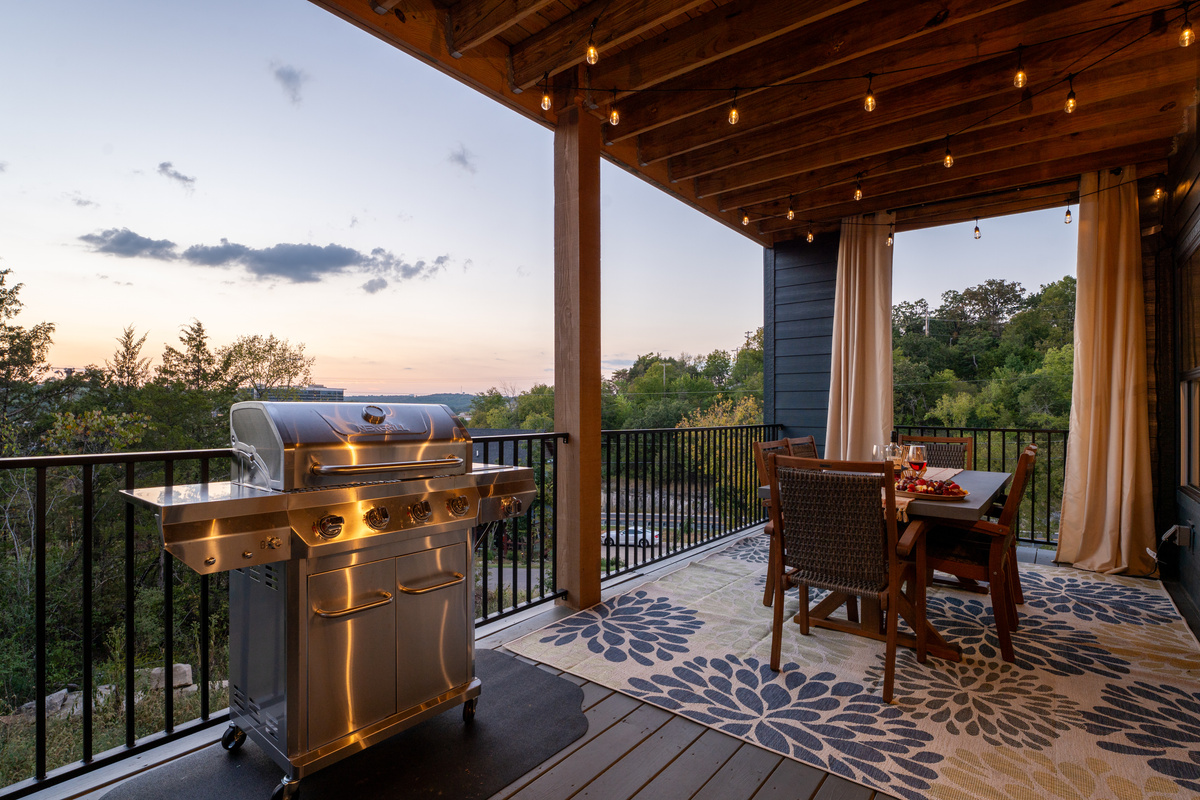 Covered lower patio

The covered patio offers another outdoor place to unwind, with comfortable seating and peaceful views beyond the railing.