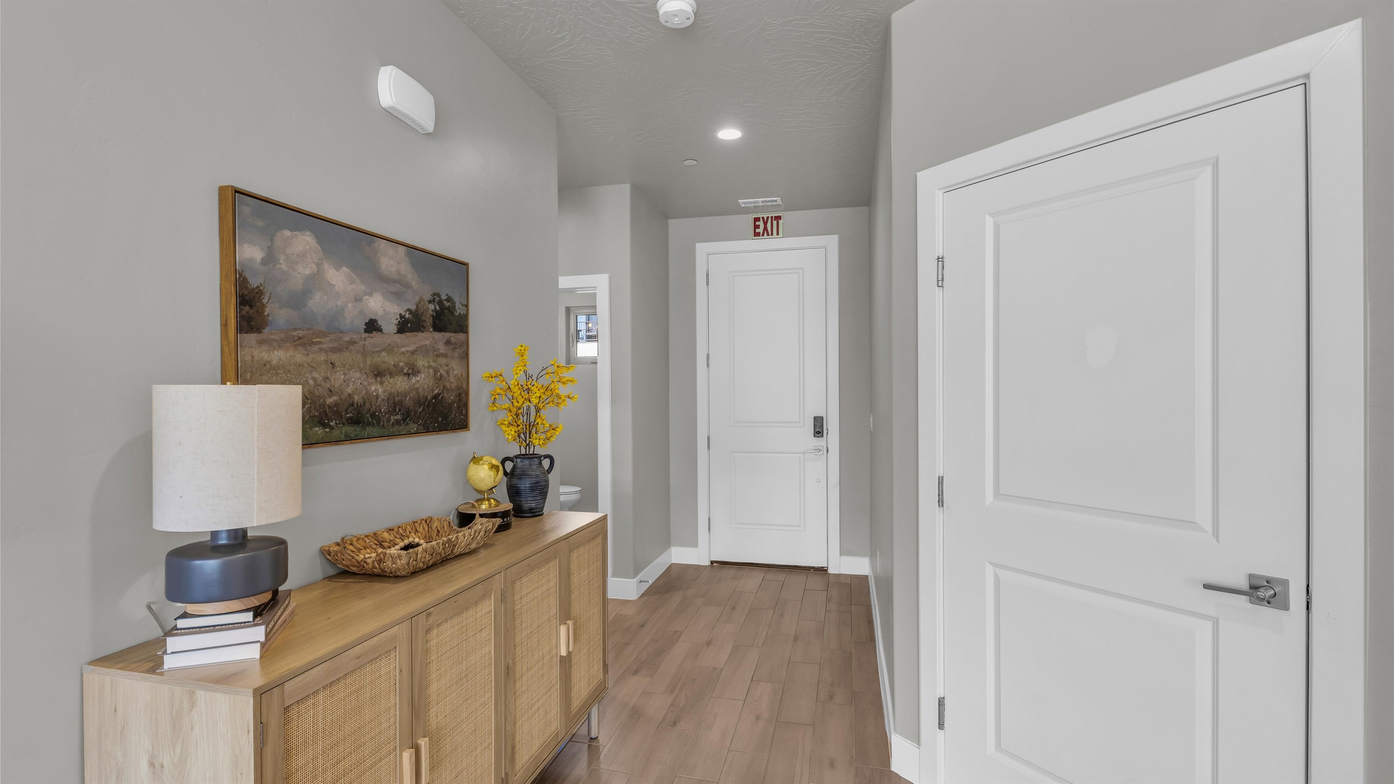 Welcoming Foyer with Stylish Console & Artwork