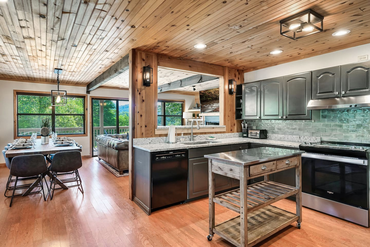 kitchen from the side door and staircase to upper level