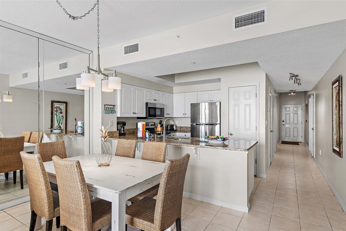 Living Space features Gulf Views, Seating for 6 in the living and dining rooms, and a fully-stocked kitchen with granite countertops