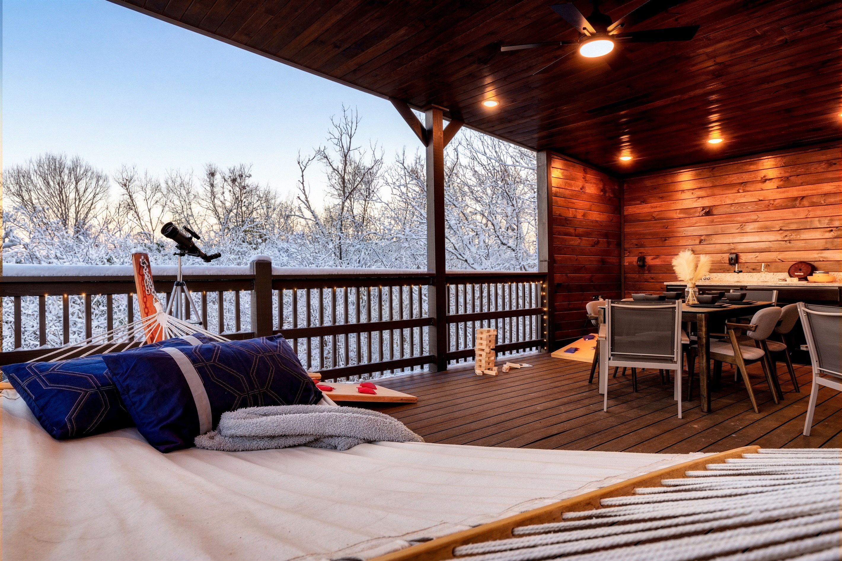 Skydeck outdoor seating with electric fireplace; life size games like cornhole, jumbo blocks and Connect 4.