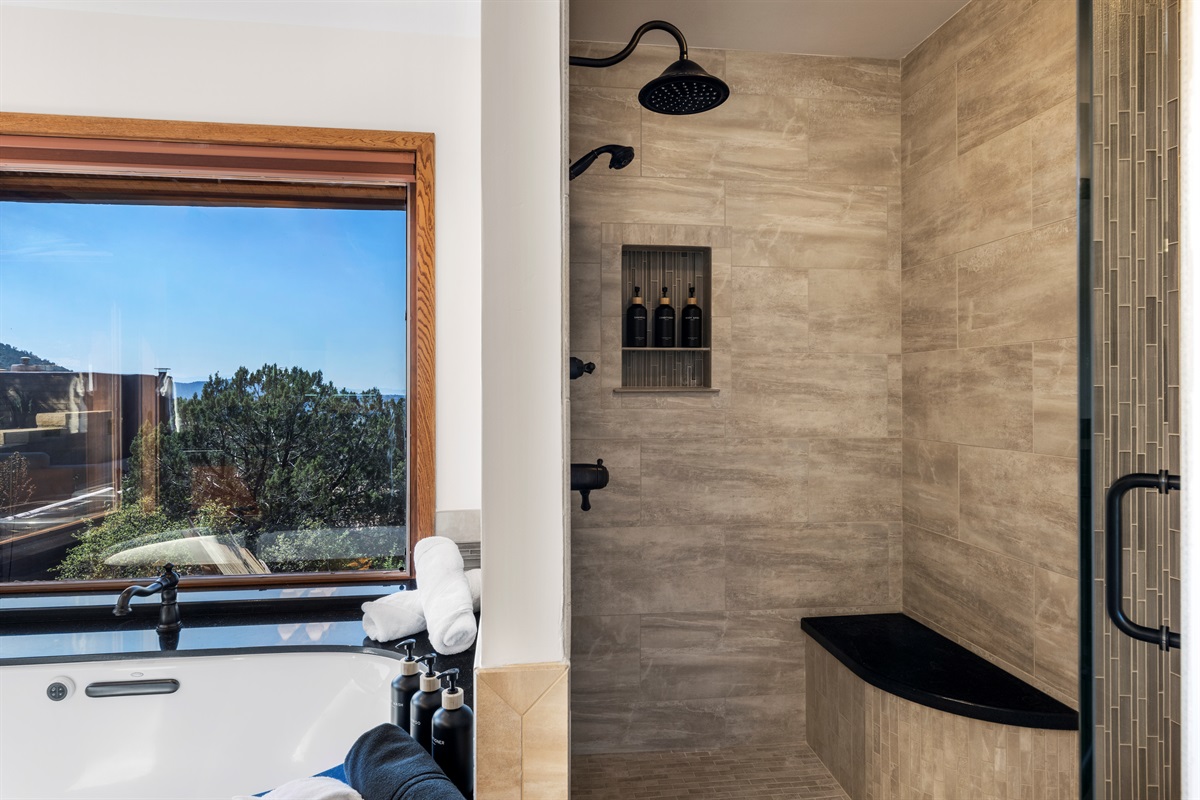 Ensuite Bathroom 1:
Refresh and unwind—spacious walk-in shower paired with a relaxing soaking tub.